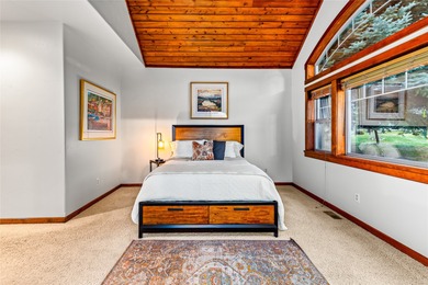 Set along the 2nd green in the prestigious Eagle Bend Golf on Eagle Bend Golf Course in Montana - for sale on GolfHomes.com, golf home, golf lot