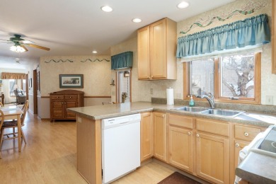 Showings begin after the open house on Sunday February 23 on Krueger-Haskell Golf Course in Wisconsin - for sale on GolfHomes.com, golf home, golf lot