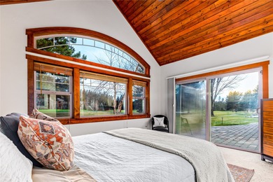 Set along the 2nd green in the prestigious Eagle Bend Golf on Eagle Bend Golf Course in Montana - for sale on GolfHomes.com, golf home, golf lot