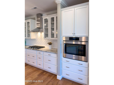 Welcome to this beautifully appointed 4-bed, 3-bath home in The on Members Club At St. James Plantation in North Carolina - for sale on GolfHomes.com, golf home, golf lot