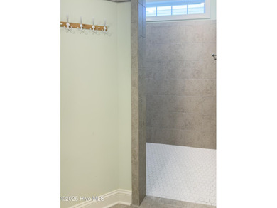 Welcome to this beautifully appointed 4-bed, 3-bath home in The on Members Club At St. James Plantation in North Carolina - for sale on GolfHomes.com, golf home, golf lot