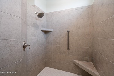 Welcome to this beautifully appointed 4-bed, 3-bath home in The on Members Club At St. James Plantation in North Carolina - for sale on GolfHomes.com, golf home, golf lot