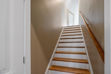 Welcome to this beautifully appointed 4-bed, 3-bath home in The on Members Club At St. James Plantation in North Carolina - for sale on GolfHomes.com, golf home, golf lot