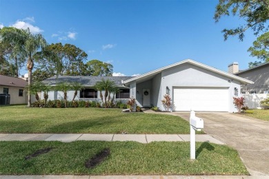 Welcome to your dream home in Feather Sound! This completely on Feather Sound Country Club in Florida - for sale on GolfHomes.com, golf home, golf lot