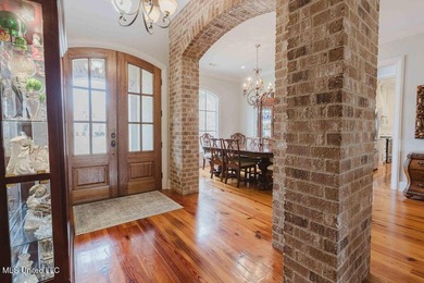 Welcome to 105 Bristol Drive in the desirable Reunion on Reunion Golf Club in Mississippi - for sale on GolfHomes.com, golf home, golf lot