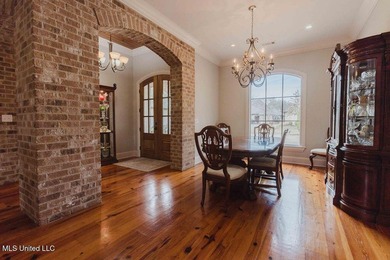 Welcome to 105 Bristol Drive in the desirable Reunion on Reunion Golf Club in Mississippi - for sale on GolfHomes.com, golf home, golf lot