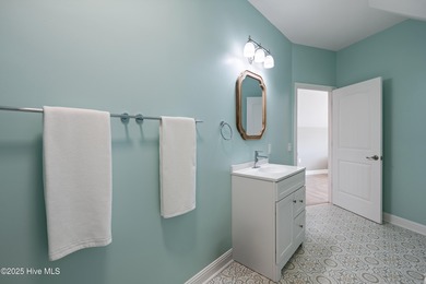 Welcome to this beautifully appointed 4-bed, 3-bath home in The on Members Club At St. James Plantation in North Carolina - for sale on GolfHomes.com, golf home, golf lot