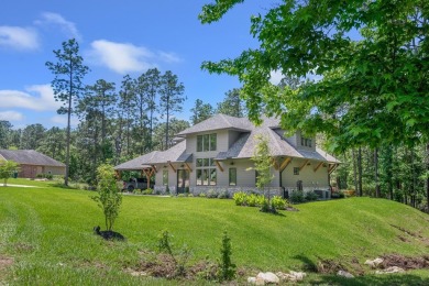 This stunning 2-story residence, nestled gracefully on the on Rayburn Country Club in Texas - for sale on GolfHomes.com, golf home, golf lot