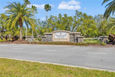 Tucked away in the exclusive gated enclave of Edgewater Village on Legacy Golf Club in Florida - for sale on GolfHomes.com, golf home, golf lot