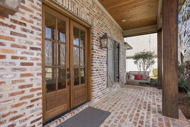 Beautifully situated on a lovely lot in Reunion, this 4-5 on Reunion Golf Club in Mississippi - for sale on GolfHomes.com, golf home, golf lot