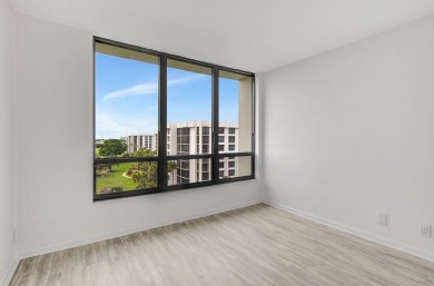 FULLY RENOVATED 7TH FLOOR CORNER UNIT!! Top to bottom upgrades on Boca West Golf and Country Club in Florida - for sale on GolfHomes.com, golf home, golf lot