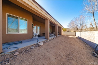 This 2018 single-family home offers the perfect blend of modern on Cerbat Cliffs Golf Course in Arizona - for sale on GolfHomes.com, golf home, golf lot