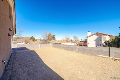 This 2018 single-family home offers the perfect blend of modern on Cerbat Cliffs Golf Course in Arizona - for sale on GolfHomes.com, golf home, golf lot