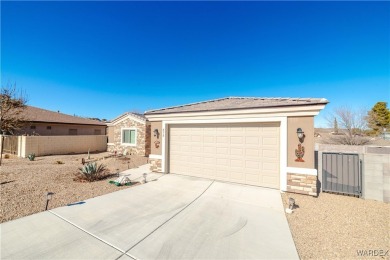 This 2018 single-family home offers the perfect blend of modern on Cerbat Cliffs Golf Course in Arizona - for sale on GolfHomes.com, golf home, golf lot