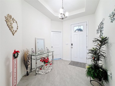 LIKE NEW and BELOW BUILDER PRICE!! 2023 built CAMDEN model on Harmony Golf Preserve in Florida - for sale on GolfHomes.com, golf home, golf lot