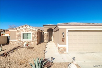 This 2018 single-family home offers the perfect blend of modern on Cerbat Cliffs Golf Course in Arizona - for sale on GolfHomes.com, golf home, golf lot