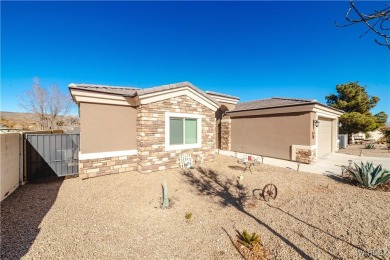 This 2018 single-family home offers the perfect blend of modern on Cerbat Cliffs Golf Course in Arizona - for sale on GolfHomes.com, golf home, golf lot