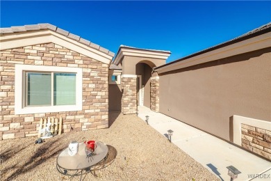 This 2018 single-family home offers the perfect blend of modern on Cerbat Cliffs Golf Course in Arizona - for sale on GolfHomes.com, golf home, golf lot