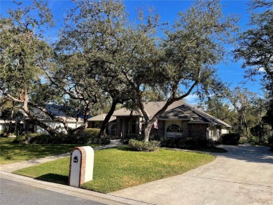 Absolutely stunning 4 bedroom, 2 bath executive home on almost 2 on Walden Lake Golf and Country Club  in Florida - for sale on GolfHomes.com, golf home, golf lot