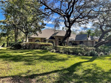 Absolutely stunning 4 bedroom, 2 bath executive home on almost 2 on Walden Lake Golf and Country Club  in Florida - for sale on GolfHomes.com, golf home, golf lot