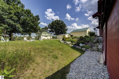 Step into the charm of Northern Michigan and a Slice of Bellaire on Shanty Creek Golf Course in Michigan - for sale on GolfHomes.com, golf home, golf lot