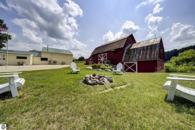 Step into the charm of Northern Michigan and a Slice of Bellaire on Shanty Creek Golf Course in Michigan - for sale on GolfHomes.com, golf home, golf lot