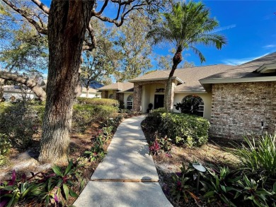 Absolutely stunning 4 bedroom, 2 bath executive home on almost 2 on Walden Lake Golf and Country Club  in Florida - for sale on GolfHomes.com, golf home, golf lot