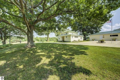 Step into the charm of Northern Michigan and a Slice of Bellaire on Shanty Creek Golf Course in Michigan - for sale on GolfHomes.com, golf home, golf lot