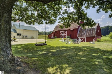 Step into the charm of Northern Michigan and a Slice of Bellaire on Shanty Creek Golf Course in Michigan - for sale on GolfHomes.com, golf home, golf lot