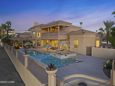 Welcome to 2325 Demaret Drive, an iconic and timeless estate on London Bridge Golf Course in Arizona - for sale on GolfHomes.com, golf home, golf lot