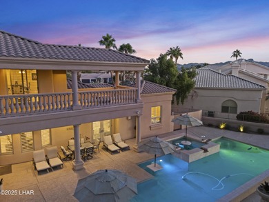 Welcome to 2325 Demaret Drive, an iconic and timeless estate on London Bridge Golf Course in Arizona - for sale on GolfHomes.com, golf home, golf lot