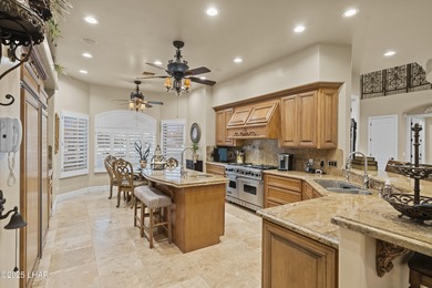 Welcome to 2325 Demaret Drive, an iconic and timeless estate on London Bridge Golf Course in Arizona - for sale on GolfHomes.com, golf home, golf lot