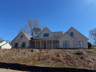 Custom Modern Farmhouse design in the established Sandy Creek on Double Oaks Golf Club in Georgia - for sale on GolfHomes.com, golf home, golf lot