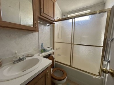 Great deal on a park model manufactured home in Beaver Dam on Beaver Dam Resort in Arizona - for sale on GolfHomes.com, golf home, golf lot