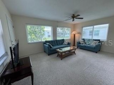 Desirable 55+ Community; Step inside to discover a warm and on Mainlands Golf Club in Florida - for sale on GolfHomes.com, golf home, golf lot
