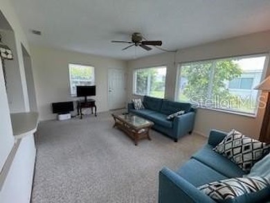 Desirable 55+ Community; Step inside to discover a warm and on Mainlands Golf Club in Florida - for sale on GolfHomes.com, golf home, golf lot