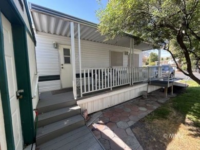 Great deal on a park model manufactured home in Beaver Dam on Beaver Dam Resort in Arizona - for sale on GolfHomes.com, golf home, golf lot