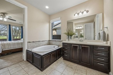 Welcome to 11948 Tranquil Cove, a beautifully designed home on Texas Star Golf Course in Texas - for sale on GolfHomes.com, golf home, golf lot