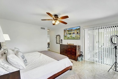 Welcome to this beautifully maintained 3-bedroom, 2-bath home on Fountains Golf and Country Club in Florida - for sale on GolfHomes.com, golf home, golf lot