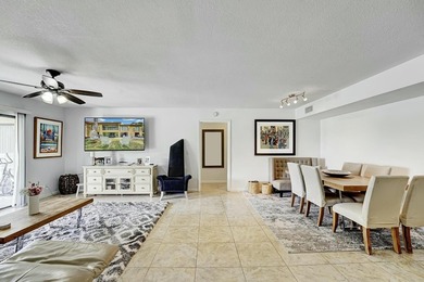 Welcome to this beautifully maintained 3-bedroom, 2-bath home on Fountains Golf and Country Club in Florida - for sale on GolfHomes.com, golf home, golf lot