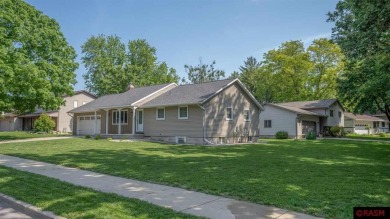Step into this inviting 3-bedroom, 3-bathroom home where on New Ulm Country Club in Minnesota - for sale on GolfHomes.com, golf home, golf lot