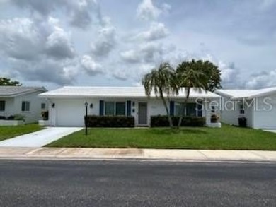 Desirable 55+ Community; Step inside to discover a warm and on Mainlands Golf Club in Florida - for sale on GolfHomes.com, golf home, golf lot
