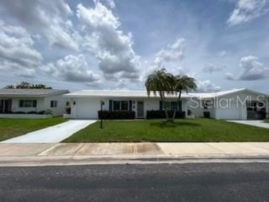 Desirable 55+ Community; Step inside to discover a warm and on Mainlands Golf Club in Florida - for sale on GolfHomes.com, golf home, golf lot