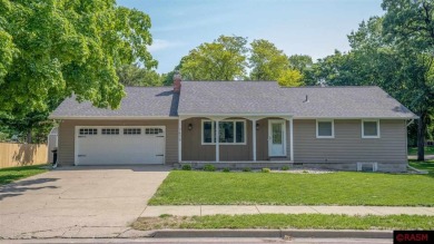 Step into this inviting 3-bedroom, 3-bathroom home where on New Ulm Country Club in Minnesota - for sale on GolfHomes.com, golf home, golf lot