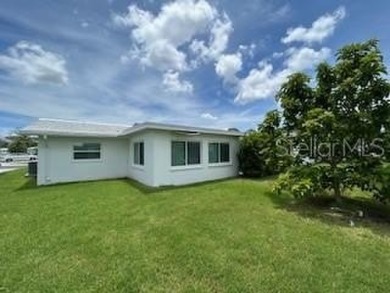 Desirable 55+ Community; Step inside to discover a warm and on Mainlands Golf Club in Florida - for sale on GolfHomes.com, golf home, golf lot