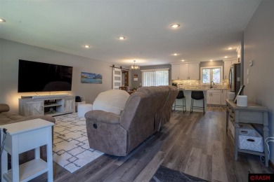 Step into this inviting 3-bedroom, 3-bathroom home where on New Ulm Country Club in Minnesota - for sale on GolfHomes.com, golf home, golf lot