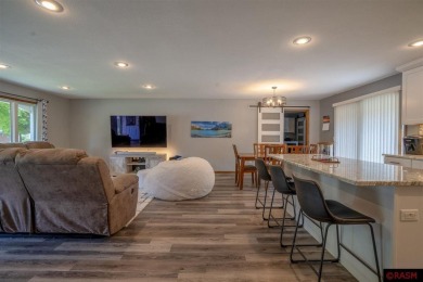 Step into this inviting 3-bedroom, 3-bathroom home where on New Ulm Country Club in Minnesota - for sale on GolfHomes.com, golf home, golf lot