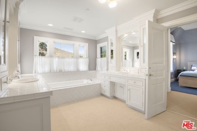 Gorgeous custom-built estate tucked away on a private street in on North Ranch Country Club in California - for sale on GolfHomes.com, golf home, golf lot