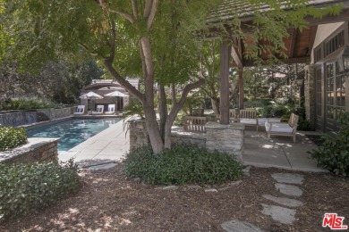 Gorgeous custom-built estate tucked away on a private street in on North Ranch Country Club in California - for sale on GolfHomes.com, golf home, golf lot