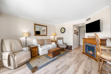 Dramatic lake, fairway and views of the Santa Rosa Mountains on Palm Royale Country Club in California - for sale on GolfHomes.com, golf home, golf lot